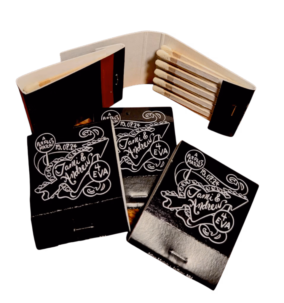 black matchbooks with white custom screen printed logos