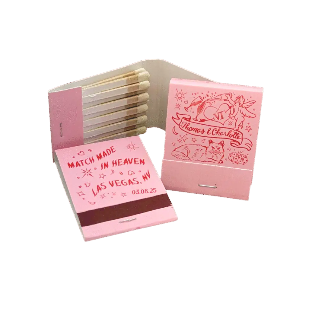 three pink wedding matchbooks with red custom illustrations